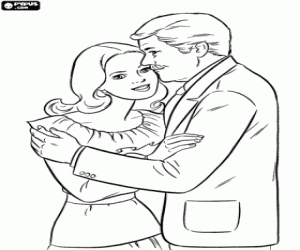 Dad gives her a kiss on the cheek of his daughter after receiving the Father