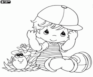 A little boy with a frog coloring page