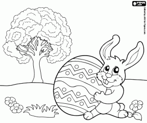 Rabbit, Easter egg in garden coloring page