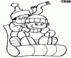 Two children sledding down in a sleigh