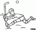 Field hockey - Player with the stick high to control a raised ball