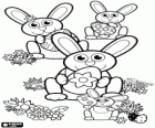 Bunnies with decorated Easter eggs