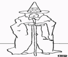 Witch with cone-shaped hat and leaning on a stick