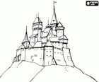 Fortified building or castle on top of a mountain