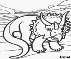 Triceratops dinosaur with three horns in a desert landscape