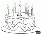Puzzle of birthday cake with seven candles lit