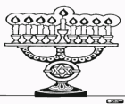 Nine-branched candelabrum with lighted candles, a Hanukiah used in the celebrations of Hanukkah