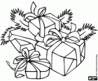Christmas gifts adorned with ribbons and leaves of fir