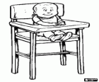Baby with the bib seated in his high chair ready to eat