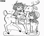 Children playing with a Christmas reindeer