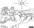 The Magi arrive with their camels to Bethlehem after following the Christmas Star