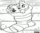 Dalmatian puppy in a Christmas sock hung on the chimney