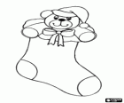 Christmas sock hung with teddy bear