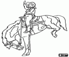 Young cowboy riding a horse rider on the front legs