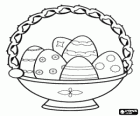 Beautiful decorative bowl filled with Easter eggs