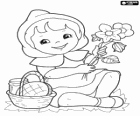 Little Red Riding Hood keeps playing with the flowers in the forest