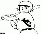 Young baseball player with his helmet and bat ready to hit