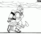 Fireman with mask, oxygen tank and ax walking crouched under the thick smoke from a fire