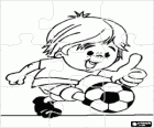 Puzzle of boy playing football