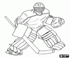 Ice-hockey goaltender, netminder or goalie with stick, helmet and all the protections during a pre-game warmup 