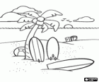 Surfboards under a palm tree in the sand on the beach in summertime