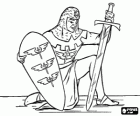 Medieval warrior kneeling with sword and shield