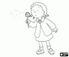 Clementine, a Calliou's friend, blowing the ripe fruits of a dandelion