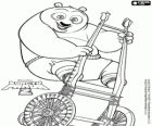 The giant panda Po has fun on a small two-wheeled cart