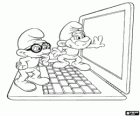 Papa Smurf and Brainy Smurf are discovering a laptop