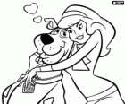 Daphne embracing Scooby Doo
