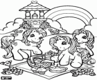 Three little pony in a picnic in the countryside. My Little Pony