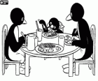 Pingu with his parents at the table eating