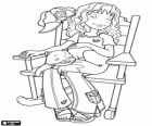 Holly Hobbie resting in a rocking chair with the cat on her lap