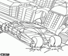 Batman in his fantastic car through the streets of Gotham City