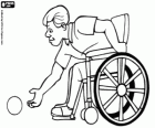 Man in wheelchair playing bocce, pétanque, boccia