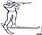 Biathlete shoots from the standing position. Biathlon: cross country skiing and rifle shooting