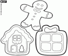 Three Christmas cookies: a gift, a house and a gingerbread man