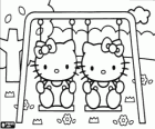 Hello Kitty and Mimmy in the playground swing