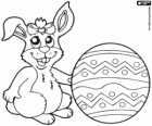 Easter bunny with a ribbon on the head and a large Easter egg