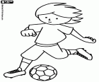 Footballer running with the ball