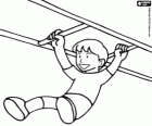 A child playing in the gymnastics bars