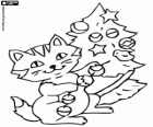 A kitten with the Christmas tree ornaments