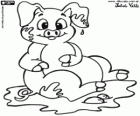 A pig in the mud, an animal in the farm