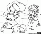 Prayer puzzle. Puzzle with two children praying in the field with a lamb
