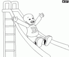 Little Bill going down the slide in the playground