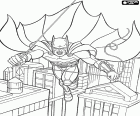 The bat man, the superhero Batman moves above the buildings of Gotham City