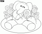 The friend of Pocoyo, the elephant Elly sitting on the ground among the flowers