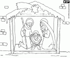 A large Nativity scene with statues to human measurement of the three main characters, the child Jesus with Mary and Joseph