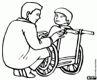 A doctor talking to a young patient sitting in the wheelchair