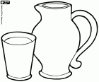 A pitcher and a glass for breakfast. Most common beverages at breakfast are milk, juices and water